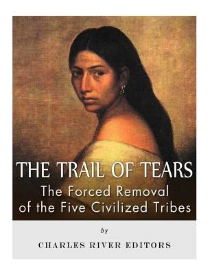 A Native American woman looks over her left shoulder. Her dark hair is long and flowy and she is wearing a white off-the-shoulder top. Across the bottom of the screen, white letters say "The Trail of Tears"