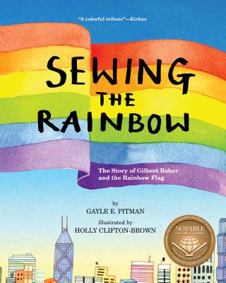 a large rainbow flag flies above a city skyline. Across the flag, black letters spell "sewing the rainbow: the story of Gilbert Baker and the Rainbow Flag"
