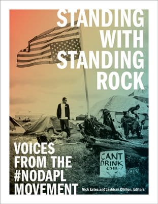 the cover of the book is a picture of tents around the Standing Rock protests. An American flag is upside down on the flag pole