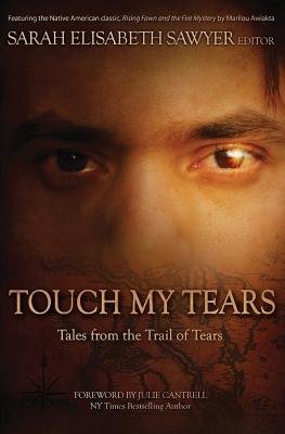 the front cover of the book is a close up photo of a Native American man. The sun is reflected in his left eye.